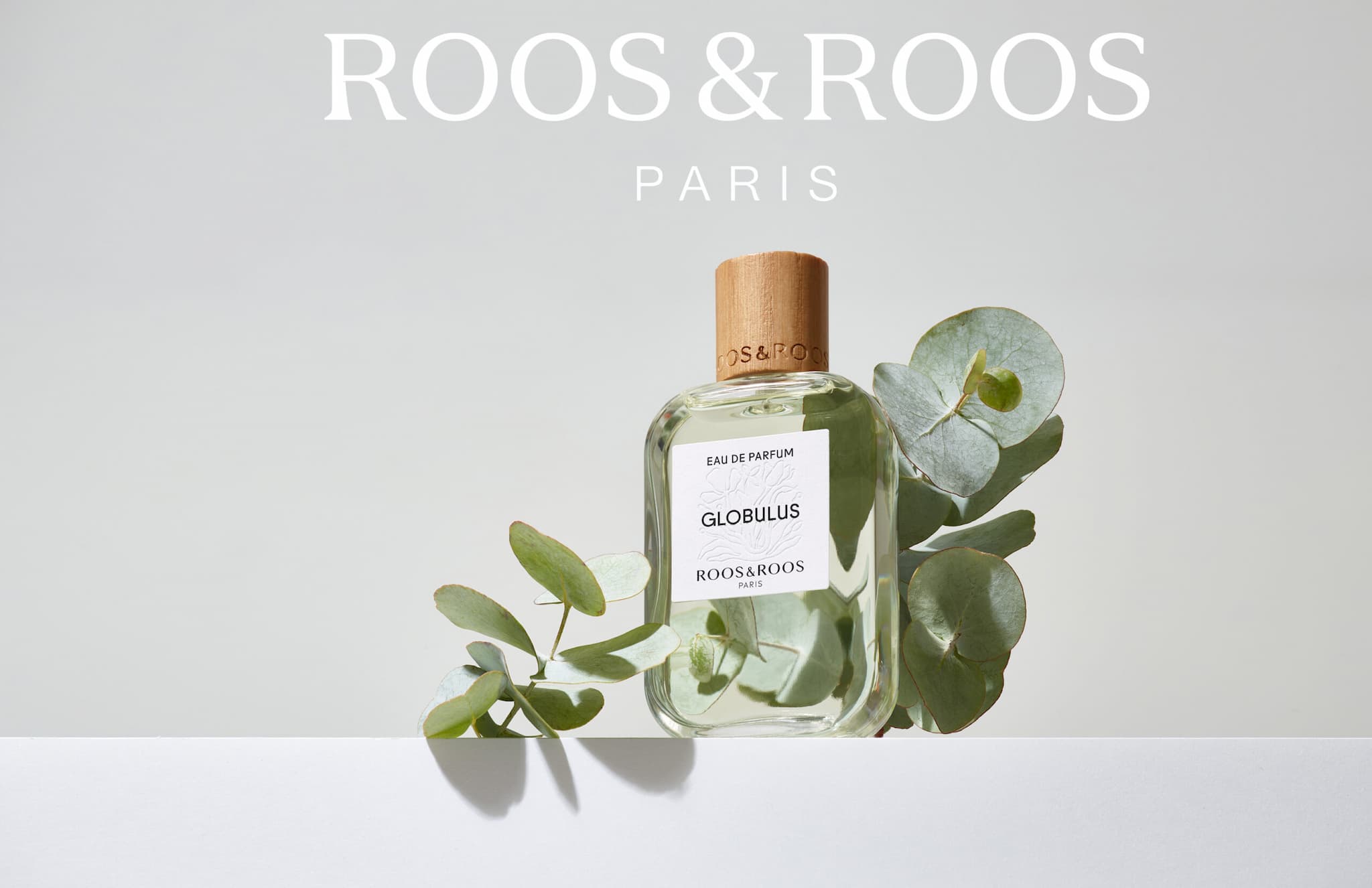 still-life advertising product cosmetics photography Roos&Roos perfume bottle eucalyptus string